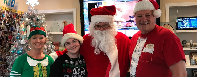 Holiday party with Santa at Braile Chiropractic in Marietta GA